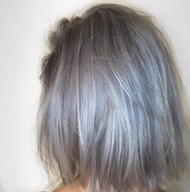 Model with blonde hair with opal balayage.